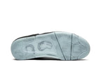 KAWS x Jordan 4 Retro Black - 930155 001